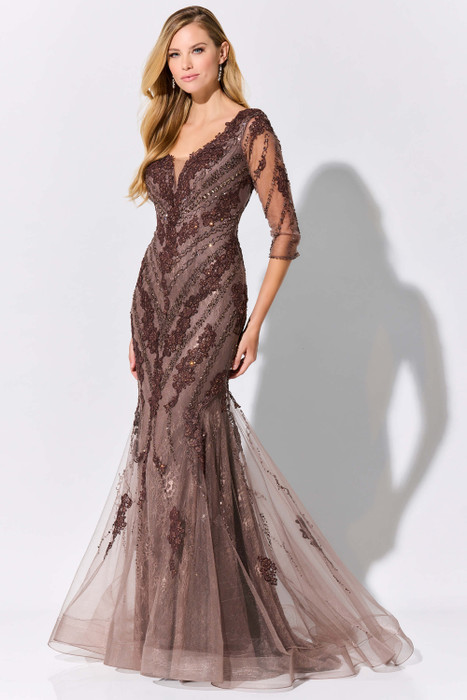 Sequined mocha lace sculpts the bodice while soft tulle flares into a graceful hem Sequined mocha lace sculpts the bodice while soft tulle flares into a graceful hem