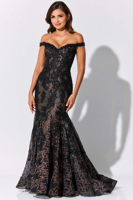 Off-shoulder black lace gown hugs the body with shimmering floral texture and sultry flair Off-shoulder black lace gown hugs the body with shimmering floral texture and sultry flair