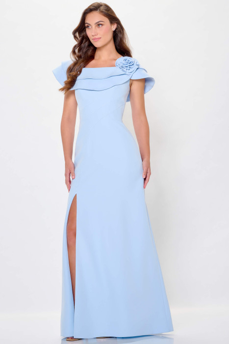 Soft blue gown with layered neckline, floral shoulder detail, and side slit