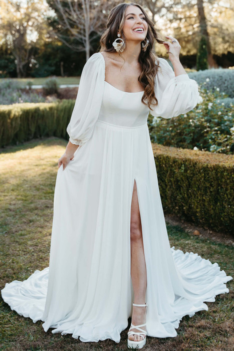 Flowy chiffon gown with detachable puff sleeves and high leg slit