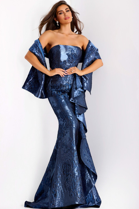 Strapless navy metallic mermaid gown with cascading ruffle and detachable shawl, front view. Strapless navy metallic mermaid gown with cascading ruffle and detachable shawl, front view.