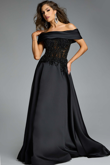 Jovani 41198 black off-shoulder gown with illusion beaded bodice and A-line mikado skirt. Jovani 41198 black off-shoulder gown with illusion beaded bodice and A-line mikado skirt.