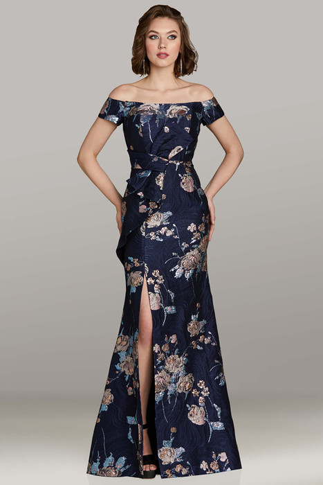 Feriani 12456 navy floral jacquard gown with fit-and-flare silhouette, off-shoulder neckline, and skirt slit Feriani 12456 navy floral jacquard gown with fit-and-flare silhouette, off-shoulder neckline, and skirt slit