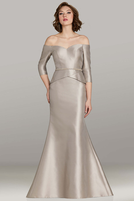 Feriani 12461 silver satin mikado gown with fit-and-flare silhouette, peplum waist, and off-shoulder neckline Feriani 12461 silver satin mikado gown with fit-and-flare silhouette, peplum waist, and off-shoulder neckline
