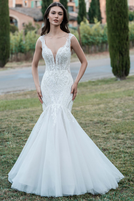 Allure Bridals A1320 front—beaded lace mermaid gown with plunging neckline and tulle skirt flare. Allure Bridals A1320 front—beaded lace mermaid gown with plunging neckline and tulle skirt flare.