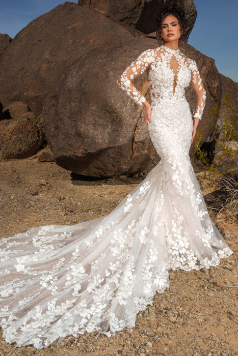 Front view of Kitty Chen Natalia lace fit-and-flare gown with long illusion sleeves Front view of Kitty Chen Natalia lace fit-and-flare gown with long illusion sleeves