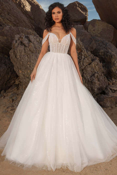 Front view of Kitty Chen Sahara ballgown with plunging sweetheart neckline and sparkle skirt Front view of Kitty Chen Sahara ballgown with plunging sweetheart neckline and sparkle skirt