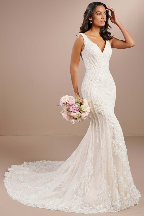 Front view of Christina Wu 15869 beaded fit and flare wedding dress with low V-neckline