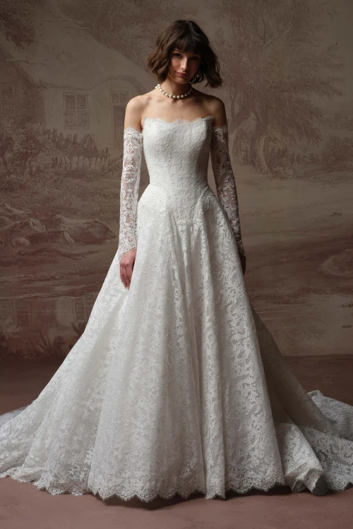 Front view of Maggie Sottero Serena lace wedding dress with detachable long lace sleeves