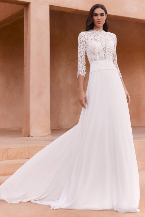 Front view of Pronovias Melanite chiffon high neck wedding dress