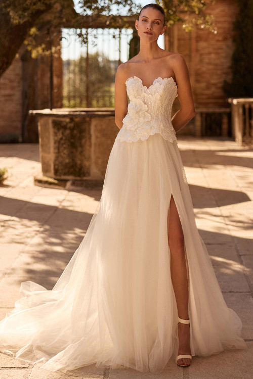 Front view of Pronovias Sagitey shimmering tulle A-line wedding dress with thigh-high slit
