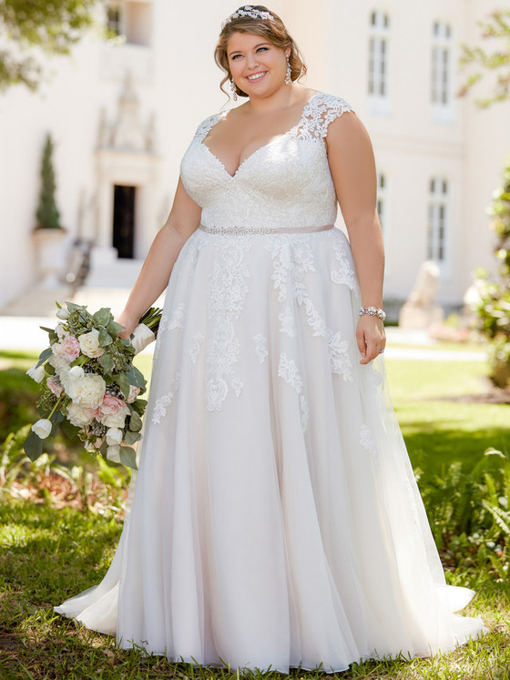 Lace cap-sleeve gown with illusion V-neckline and beaded belt accent Lace cap-sleeve gown with illusion V-neckline and beaded belt accent