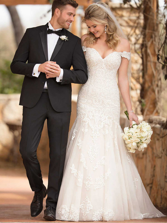 Romantic lace embroidery and off-the-shoulder sleeves define this sweetheart gown with timeless bridal elegance Romantic lace embroidery and off-the-shoulder sleeves define this sweetheart gown with timeless bridal elegance