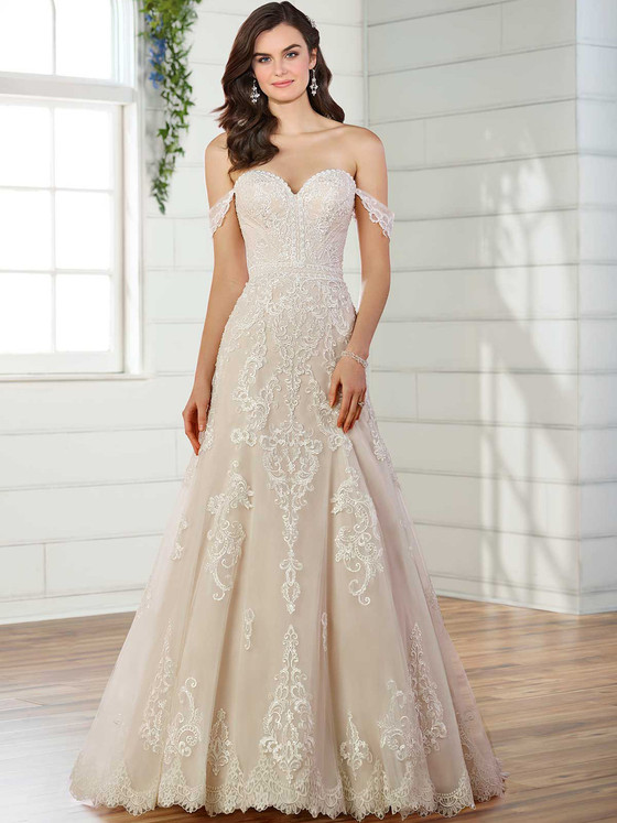 Ornate lace embroidery and a sweetheart neckline highlight the romantic charm of this off-shoulder gown Ornate lace embroidery and a sweetheart neckline highlight the romantic charm of this off-shoulder gown