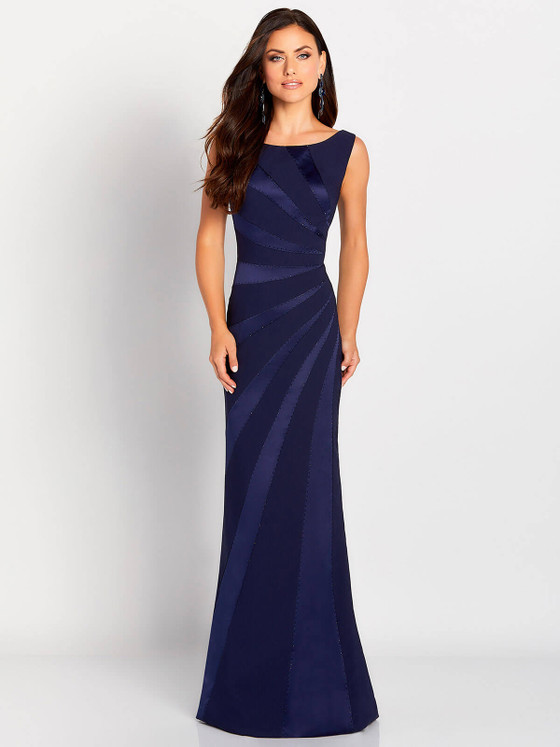 Navy column gown with tonal satin stripes and subtle beaded swirl accents Navy column gown with tonal satin stripes and subtle beaded swirl accents