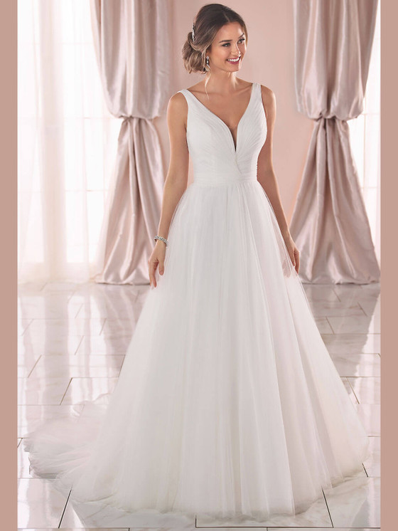 Tulle A-line gown with plunging ruched bodice and wide straps. Tulle A-line gown with plunging ruched bodice and wide straps.