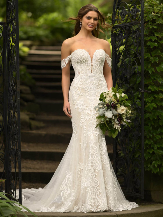 Ornate lace embroidery and off-the-shoulder sleeves add regal romance to this fitted gown Ornate lace embroidery and off-the-shoulder sleeves add regal romance to this fitted gown
