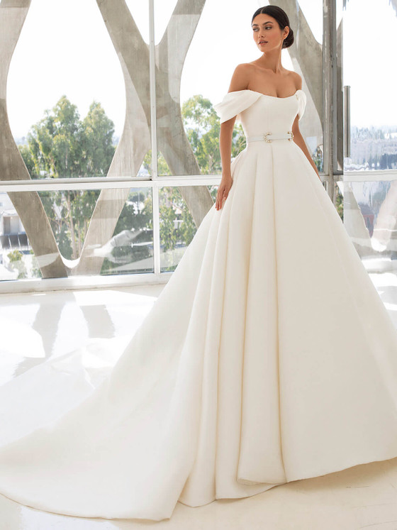 Off-shoulder mikado ball gown with pleated skirt, jeweled belt, and sweeping train Off-shoulder mikado ball gown with pleated skirt, jeweled belt, and sweeping train