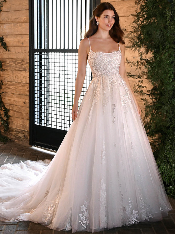 This dreamy ball gown sparkles with sequin-embroidered lace, a scoop neckline, and layers of soft tulle This dreamy ball gown sparkles with sequin-embroidered lace, a scoop neckline, and layers of soft tulle