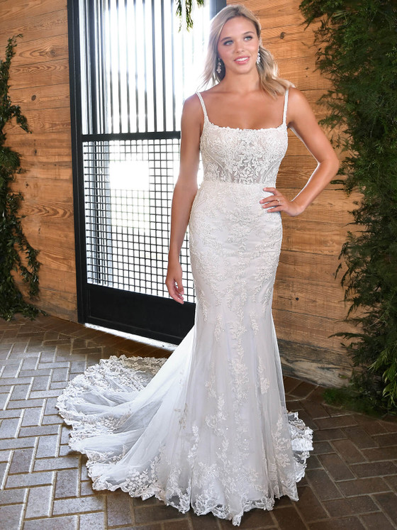 Ethereal lace overlays a sheer corset bodice and flared skirt, creating a dreamy, curve-hugging silhouette Ethereal lace overlays a sheer corset bodice and flared skirt, creating a dreamy, curve-hugging silhouette