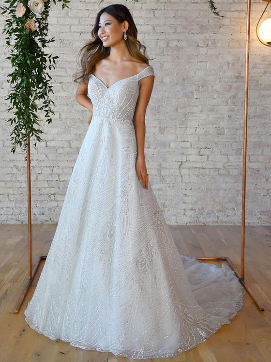 Beaded off-shoulder gown with plunging neckline and shimmering A-line skirt Beaded off-shoulder gown with plunging neckline and shimmering A-line skirt