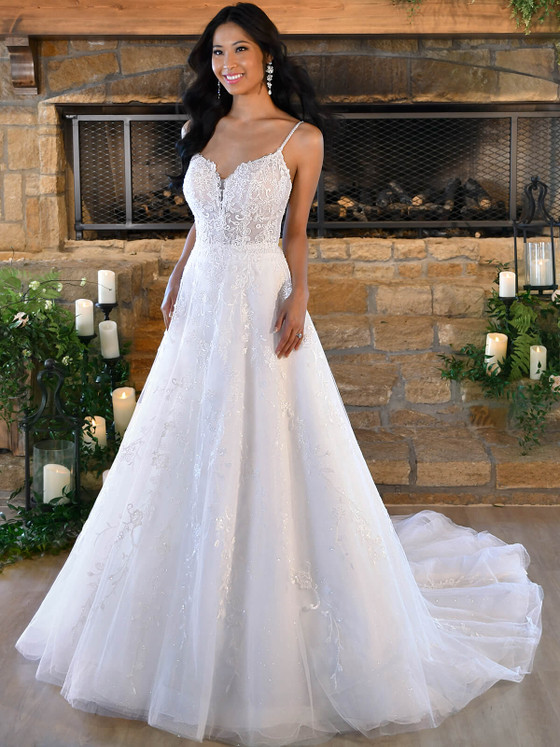 Beaded lace bodice with illusion plunge and flowing glitter tulle skirt Beaded lace bodice with illusion plunge and flowing glitter tulle skirt