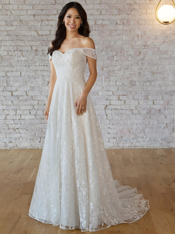 Off-shoulder A-line gown with allover lace and scalloped neckline Off-shoulder A-line gown with allover lace and scalloped neckline