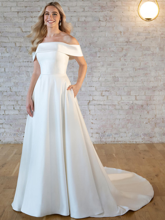 Classic A-line gown with off-shoulder neckline and structured bodice Classic A-line gown with off-shoulder neckline and structured bodice