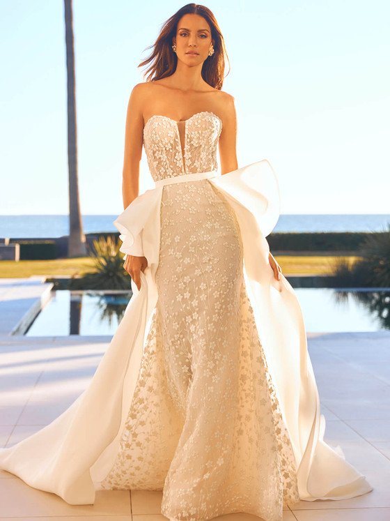 Strapless floral embroidered gown with sheer bodice and dramatic detachable overskirt for a stunning bridal look Strapless floral embroidered gown with sheer bodice and dramatic detachable overskirt for a stunning bridal look