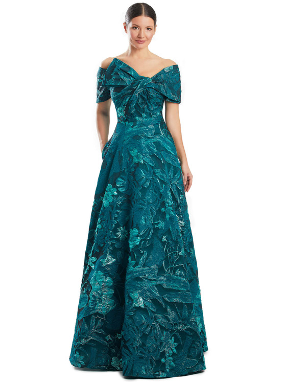 Teal A-line gown with sculpted off-shoulder bow and textured floral brocade Teal A-line gown with sculpted off-shoulder bow and textured floral brocade