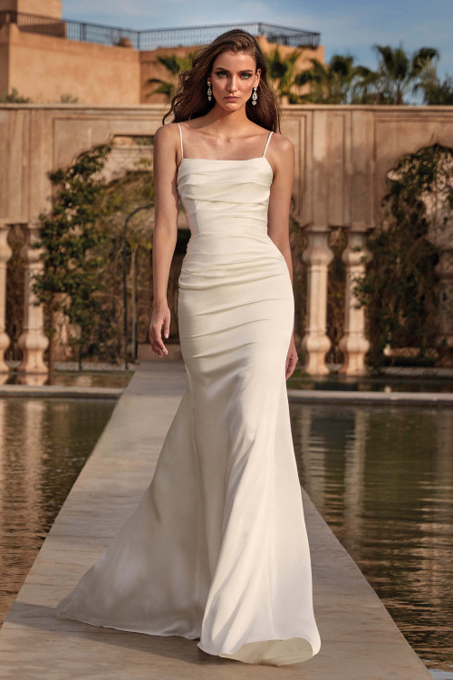 Minimalist satin gown with delicate spaghetti straps, ruched bodice, and a sleek sheath silhouette for modern elegance Minimalist satin gown with delicate spaghetti straps, ruched bodice, and a sleek sheath silhouette for modern elegance