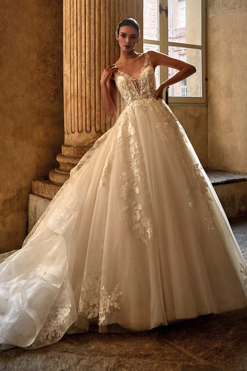 Romantic ball gown with sheer lace bodice, deep illusion neckline, and glitter tulle skirt Romantic ball gown with sheer lace bodice, deep illusion neckline, and glitter tulle skirt