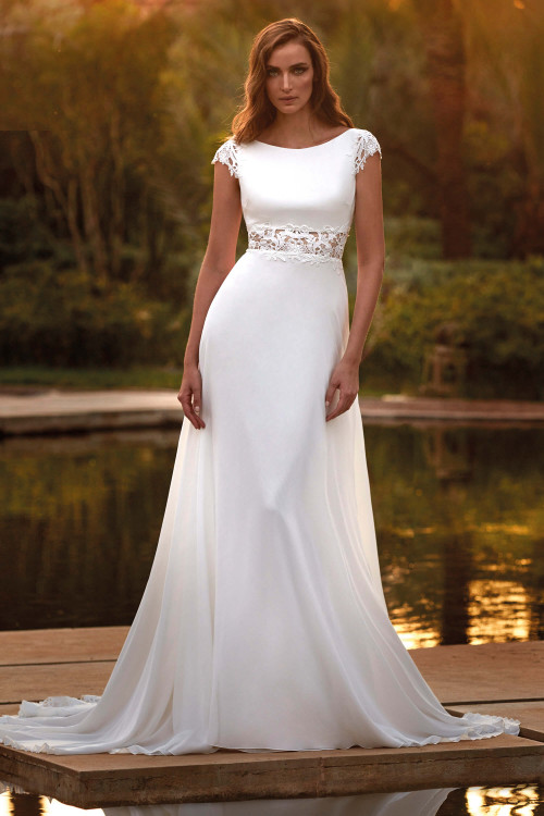 Chiffon wedding gown features cap sleeves, a bateau neckline, and a lace-embroidered illusion waist Chiffon wedding gown features cap sleeves, a bateau neckline, and a lace-embroidered illusion waist