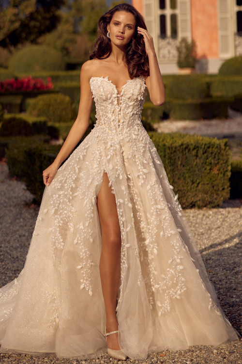 Strapless floral gown with 3D appliqués, plunging neckline, and high leg slit Strapless floral gown with 3D appliqués, plunging neckline, and high leg slit