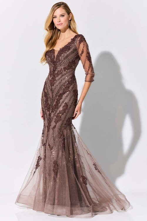 Sequined mocha lace sculpts the bodice while soft tulle flares into a graceful hem Sequined mocha lace sculpts the bodice while soft tulle flares into a graceful hem
