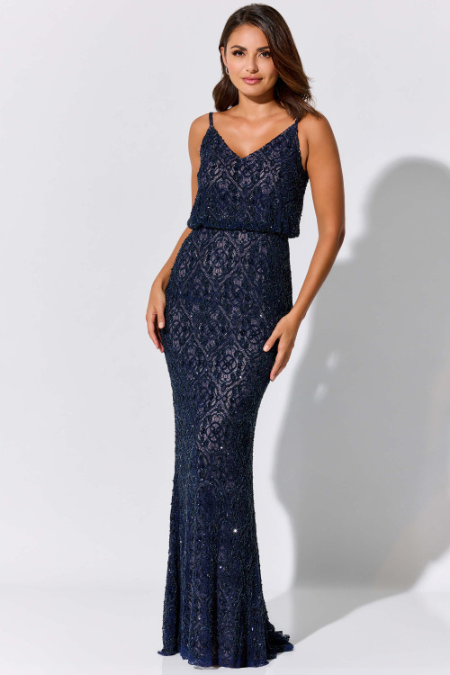 Navy beaded lace gown stuns with a flattering blouson bodice and soft flare skirt. Navy beaded lace gown stuns with a flattering blouson bodice and soft flare skirt.