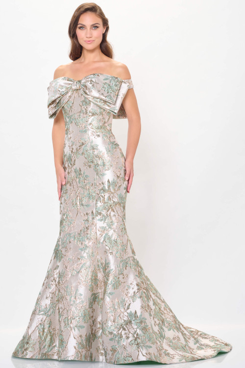 Shimmering jacquard blooms with an oversized bow and sculpted off-shoulder neckline. Shimmering jacquard blooms with an oversized bow and sculpted off-shoulder neckline.