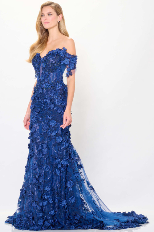 Side view of royal blue floral gown with illusion bodice and sweep train Side view of royal blue floral gown with illusion bodice and sweep train