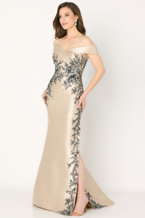 Champagne satin gown with off-shoulder neckline and black floral embroidery Champagne satin gown with off-shoulder neckline and black floral embroidery