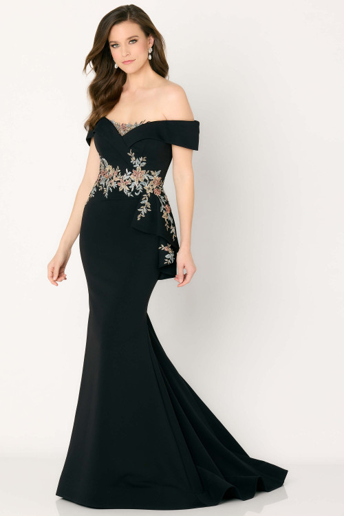 Black off-shoulder gown with multicolor floral embroidery and peplum accent Black off-shoulder gown with multicolor floral embroidery and peplum accent