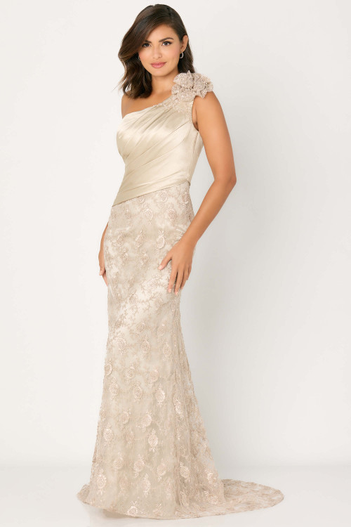 Champagne lace gown with pleated satin bodice and floral shoulder detail Champagne lace gown with pleated satin bodice and floral shoulder detail