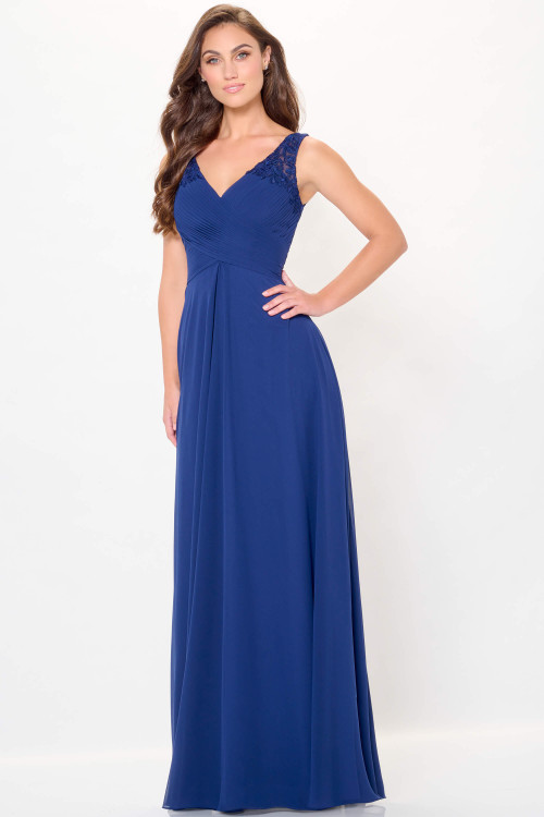 Soft chiffon gown with V-neckline, ruched bodice, and lace-detailed shoulders Soft chiffon gown with V-neckline, ruched bodice, and lace-detailed shoulders