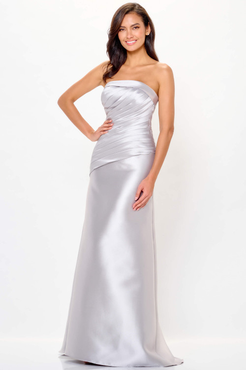 Strapless silver gown with asymmetrical pleating and sleek satin finish Strapless silver gown with asymmetrical pleating and sleek satin finish