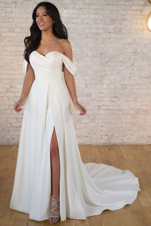 Off-shoulder A-line gown with pleated bodice and front slit Off-shoulder A-line gown with pleated bodice and front slit