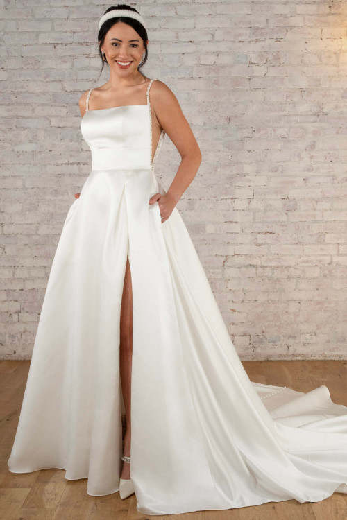 Luxe satin A-line with daring slit, pearl straps, and pockets Luxe satin A-line with daring slit, pearl straps, and pockets