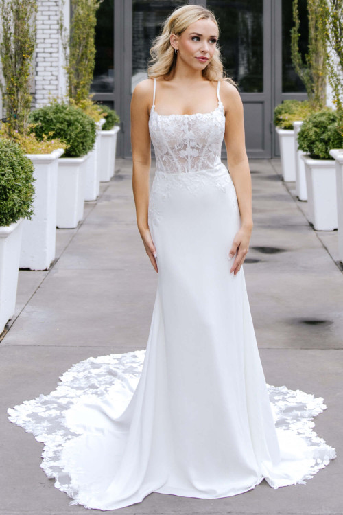 Sheer floral bodice meets sleek crepe skirt in this modern romantic silhouette Sheer floral bodice meets sleek crepe skirt in this modern romantic silhouette