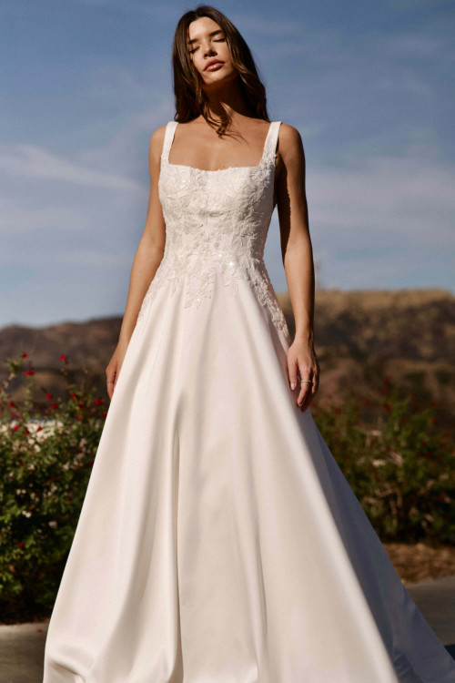 Timeless romance meets nature in this embroidered square-neck A-line gown Timeless romance meets nature in this embroidered square-neck A-line gown