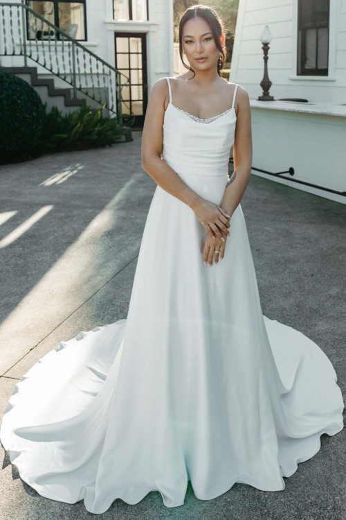 A-line gown with pearl-trimmed neckline and spaghetti straps A-line gown with pearl-trimmed neckline and spaghetti straps