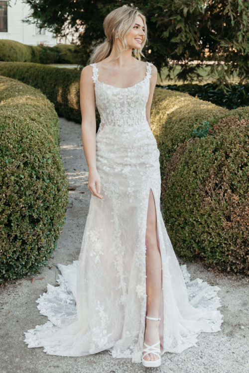 Romantic fit-and-flare gown with floral appliqué and thigh-high slit Romantic fit-and-flare gown with floral appliqué and thigh-high slit