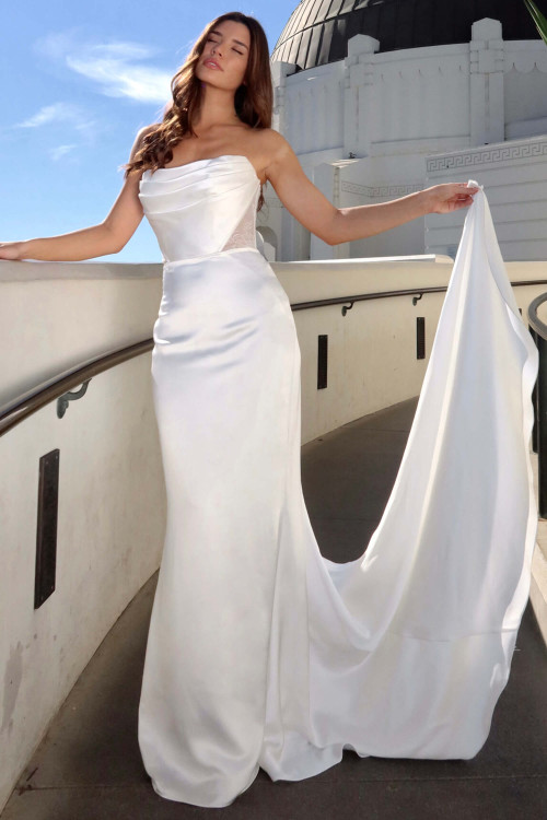 Sleek satin fitted gown with sculpted draping and sheer side cutouts for modern allure Sleek satin fitted gown with sculpted draping and sheer side cutouts for modern allure